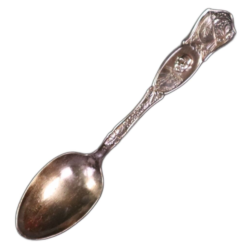 Rogers Spoon King George 1881  Embossed "Roberts" with face design